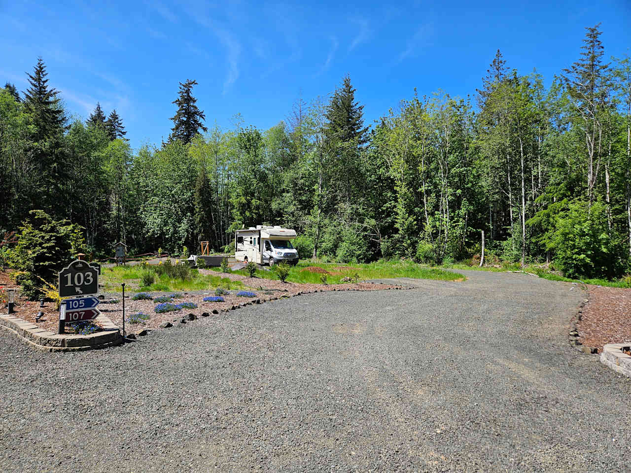 The first driveway curve is over 18' wide at its narrowest.  From here, the RV site can be accessed as pull-in/back-out.