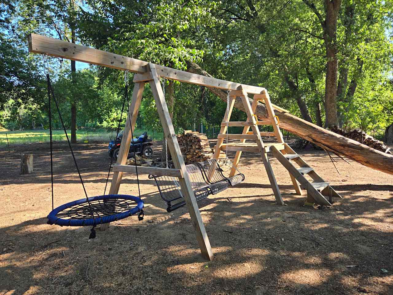 New bench swingset with plenty of space for adults to enjoy.