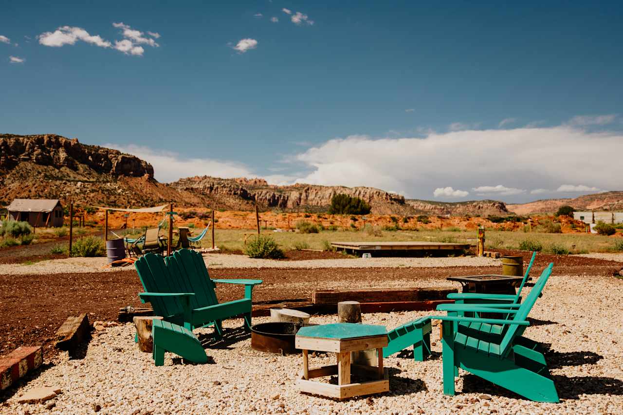 Campfire hang out area in the front of camp near the field where you will be camping. 