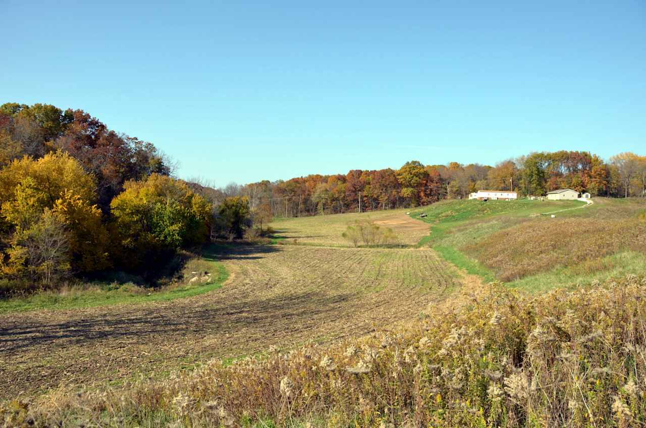 This is a north facing view from the south of the second pond valley.   The RV site is behind the cabin you see on the left.   