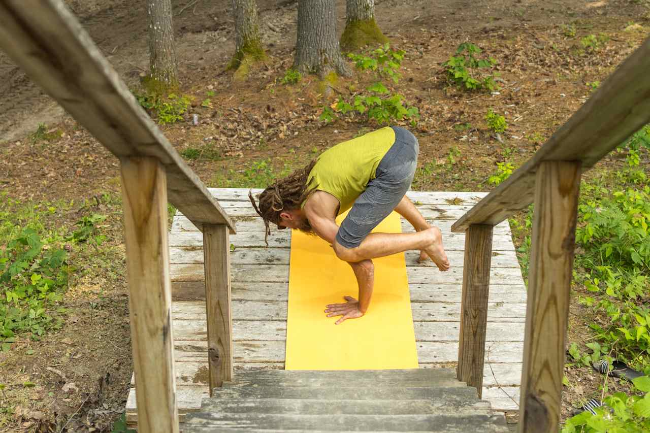 There is a yoga deck behind the sauna that can fit two mats. 