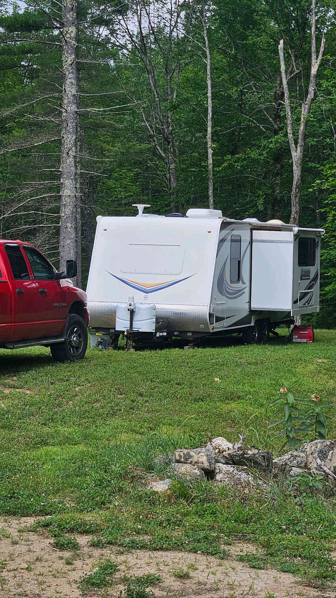 A camper and truck fit front to back without problem. 