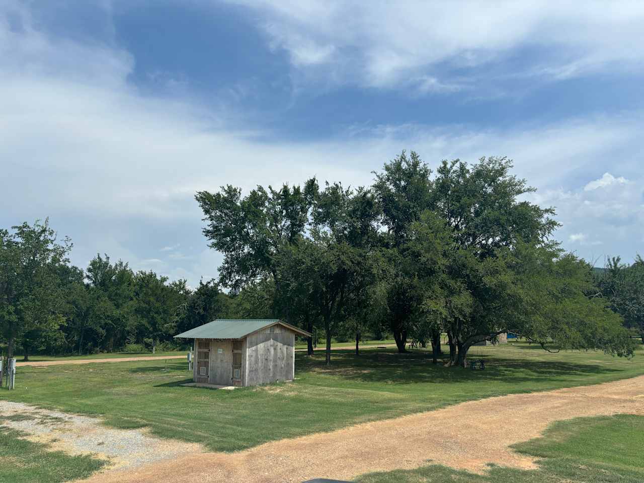 View of the bathhouse - it has two showers on one side and two bathrooms on the other. 