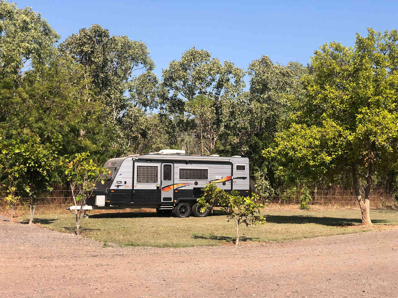 New Age Big Red available for hire on site. Air conditioned, queen size island bed, twin bunks & dining table conversion bed.