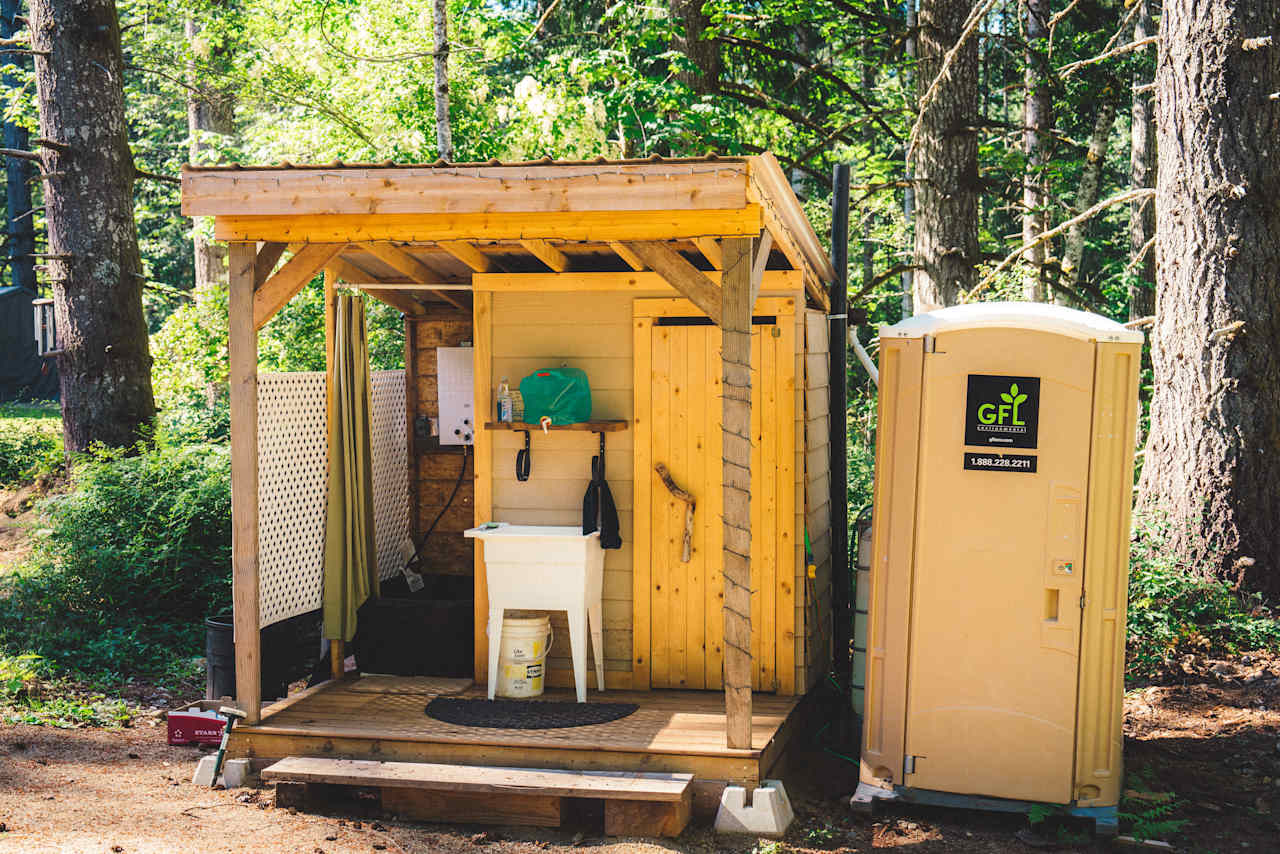 The outhouse/shower facility.