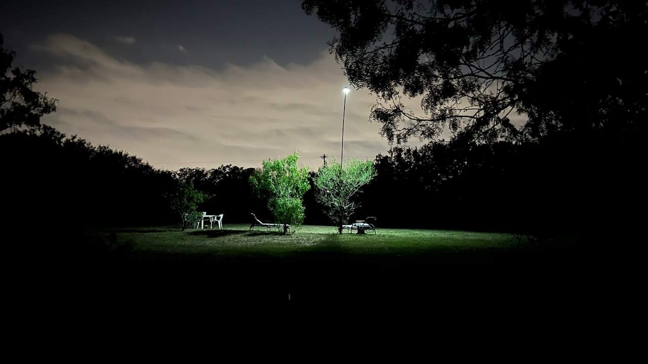 tables and seating area w solar lights