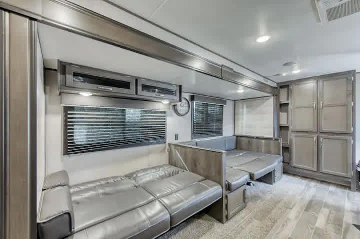 Cozy Retreat on Wheels: Charming RV Trailer