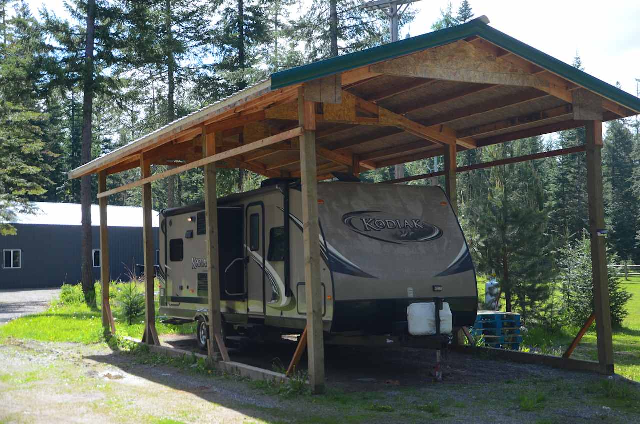 Kodiak shack aka Site 4 is one of two of our RVs available for rent. This one comes stocked with Games, Movies, and snacks including a s’mores kit.

It has AC and heat and can comfortably sleep 4 people. This space also has WiFi and Roku TV.

The outdoor picnic/BBQ area is semi private, has a propane fire pit, grill, and a picnic table enclosed by a canopy with bug netting so you can enjoy meals without the elements or stinging insects bothering you