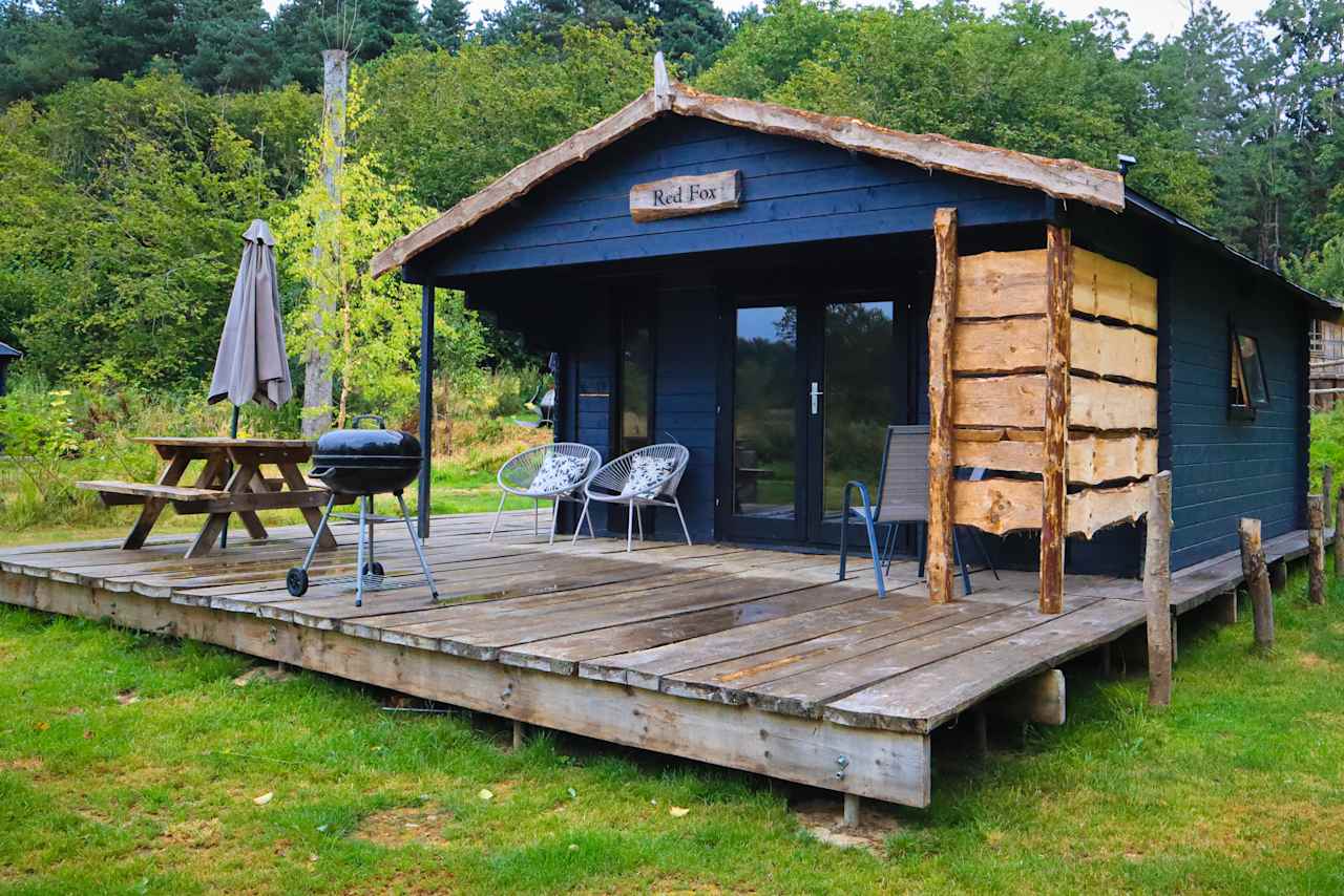 Red fox cabin offers a large decked area perfect for families