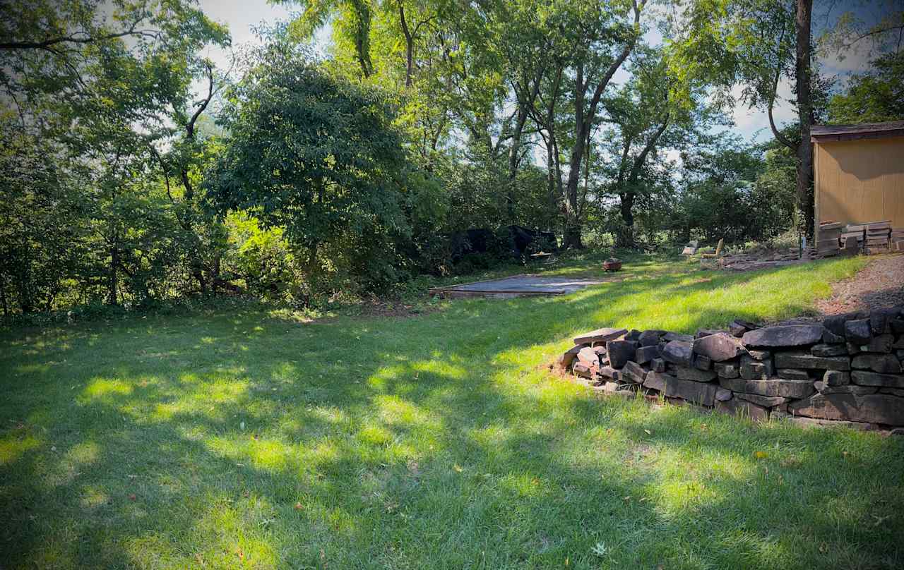 Choice of grass or gravel tent site. 