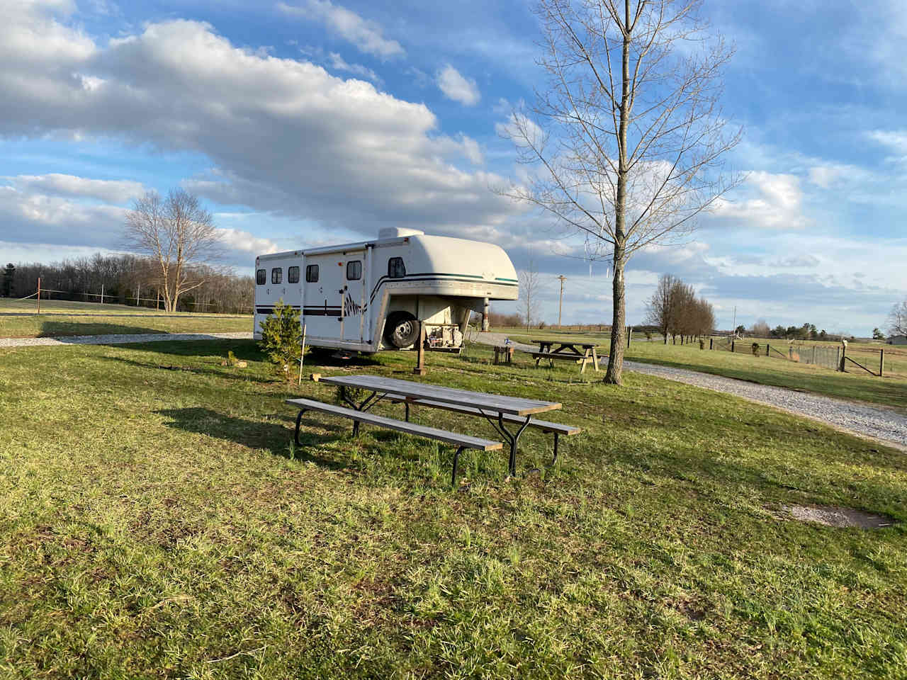 Site 4 at Noble Pine Campground has fire ring, picnic table, 30 amp electric and water with regular outlet adapter available upon request. 2 campground bathrooms a short walk away. 