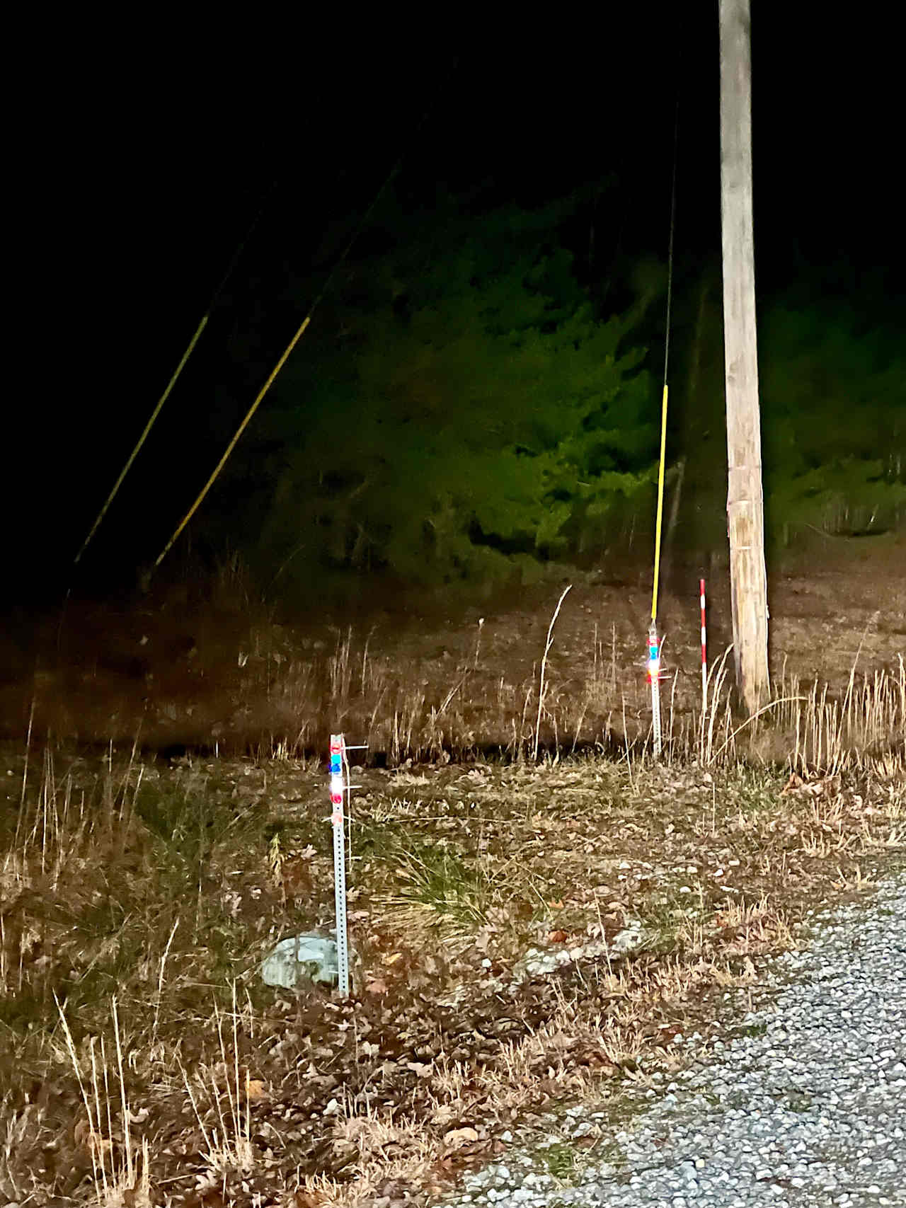 These reflective markers are on either side of culvert. Drive between there is a gravel driveway. 
