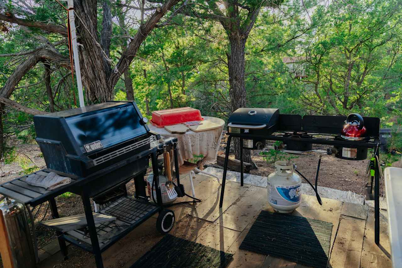 A smaller kitchen setup closer to the treehouse.