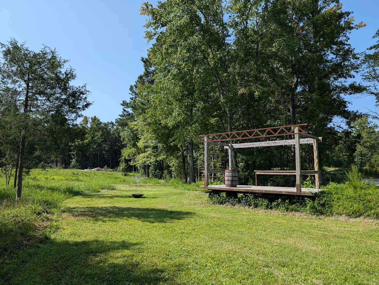 This is the campsite by the Pond/Stage. When driving in, you'll turn right down towards the pond. Pull off to the left in front of the stage before crossing the dam. Campsite is in front and to the left of the stage.