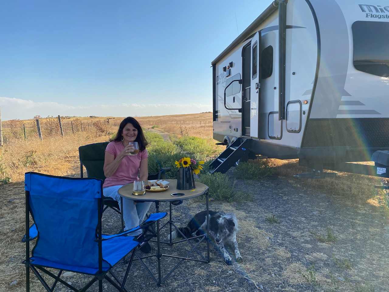 Enjoying the country camp with a friendly host dog