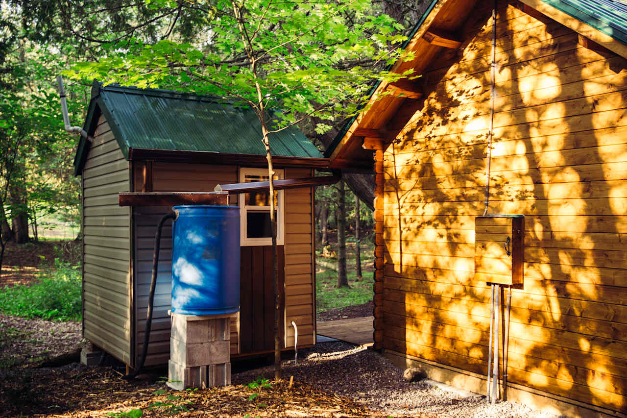 The bathrooms' sink is fed by rainwater to wash your hands, but not to drink!