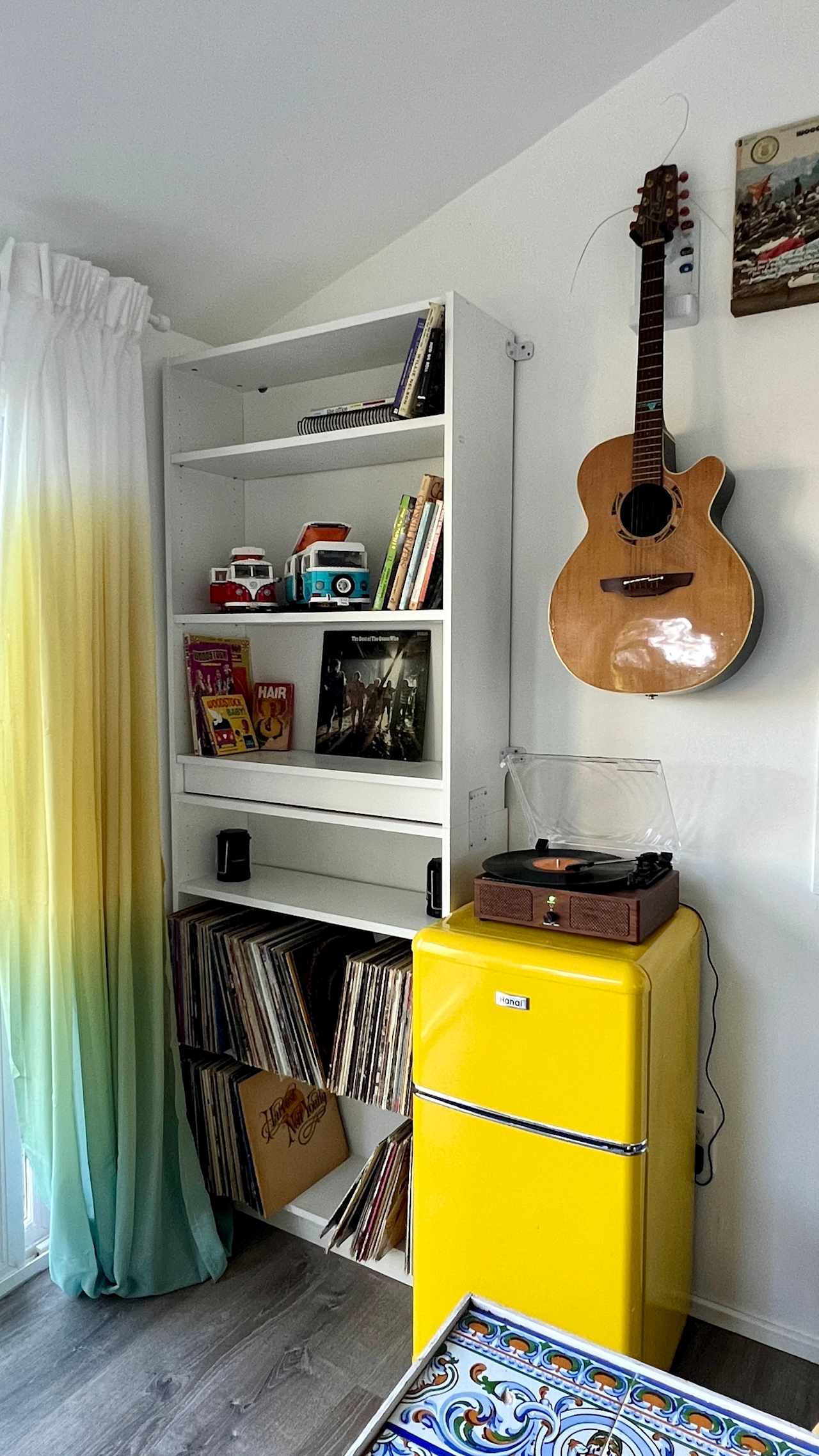 Vinyl Record collection 
Mini fridge with freezer
Record player 