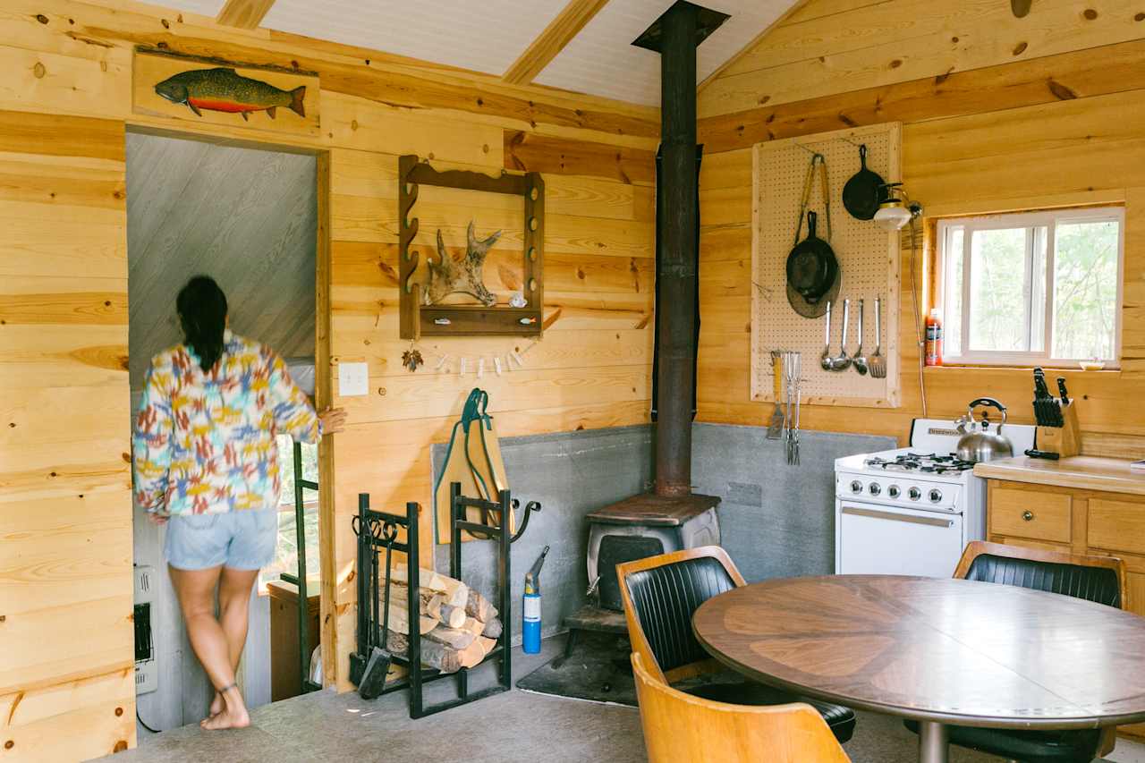 The wood stove inside the cabin.