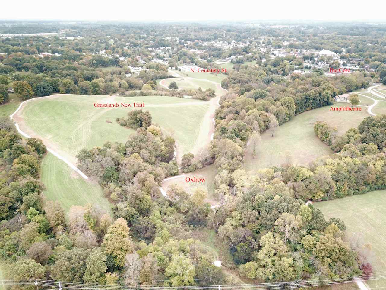 Bird's eye view of the Oxbow Campground prior to improvements, Grasslands Trail and amphitheater with Downtown Scottsville in the disctance.