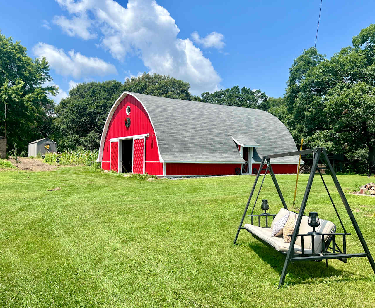 Barn in the spring time with swing for your enjoyment. Look out over the fields.