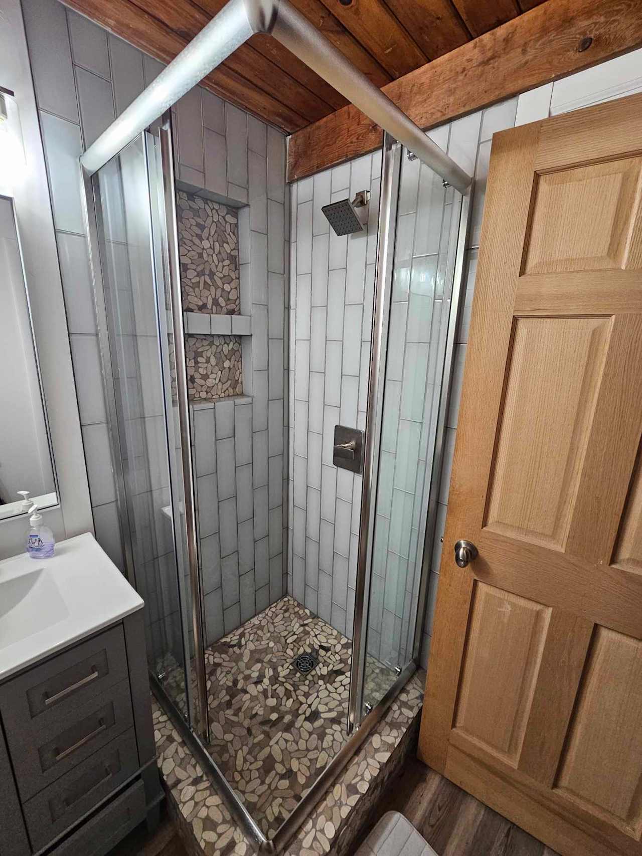 Main level full bathroom with shower