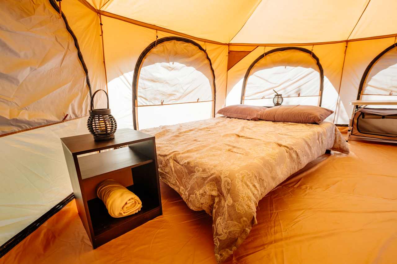 Cozy bed in the yurt.