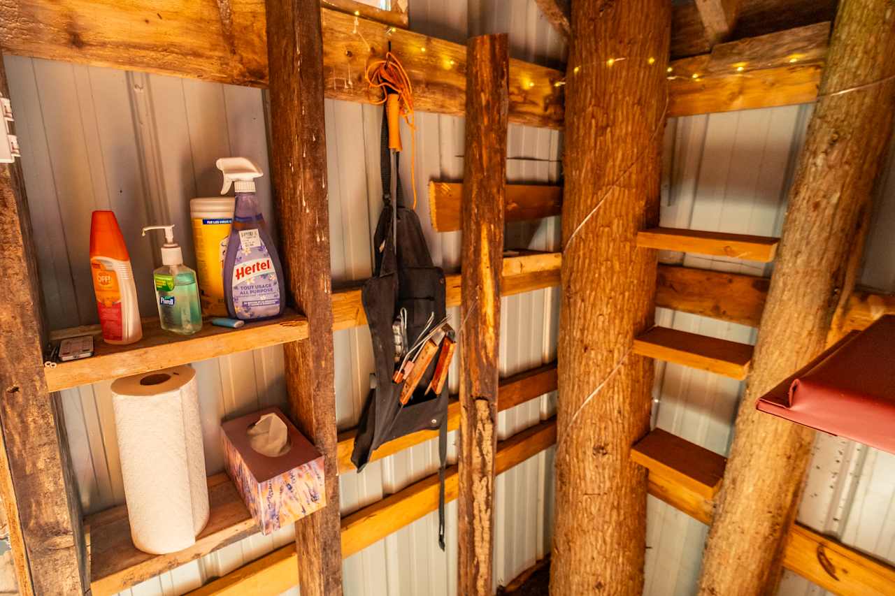 Grilling tools and amenities in the treehouse.