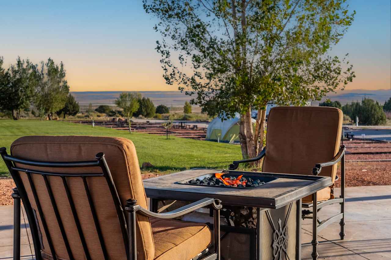 Cozy outdoor seating with firepits under our pavilion