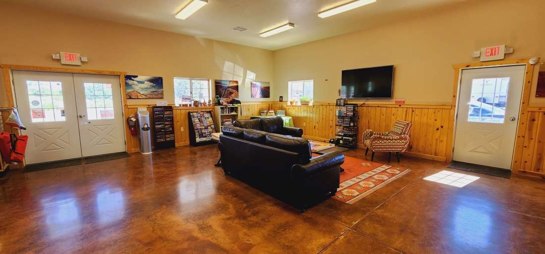 Shared TV and working area in the clubhouse.