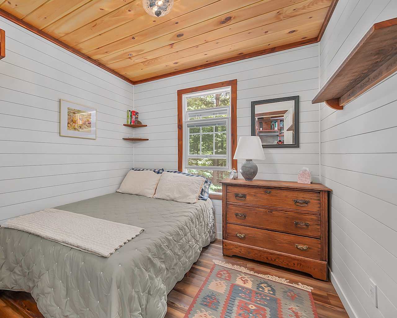 First floor bedroom with a full-sized bed