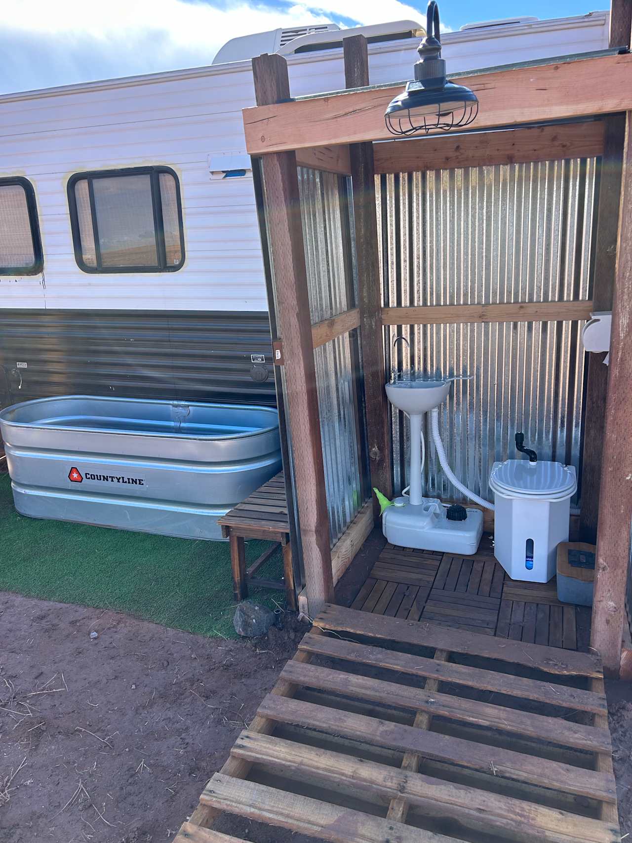 Outdoor sink and composting toilet 
