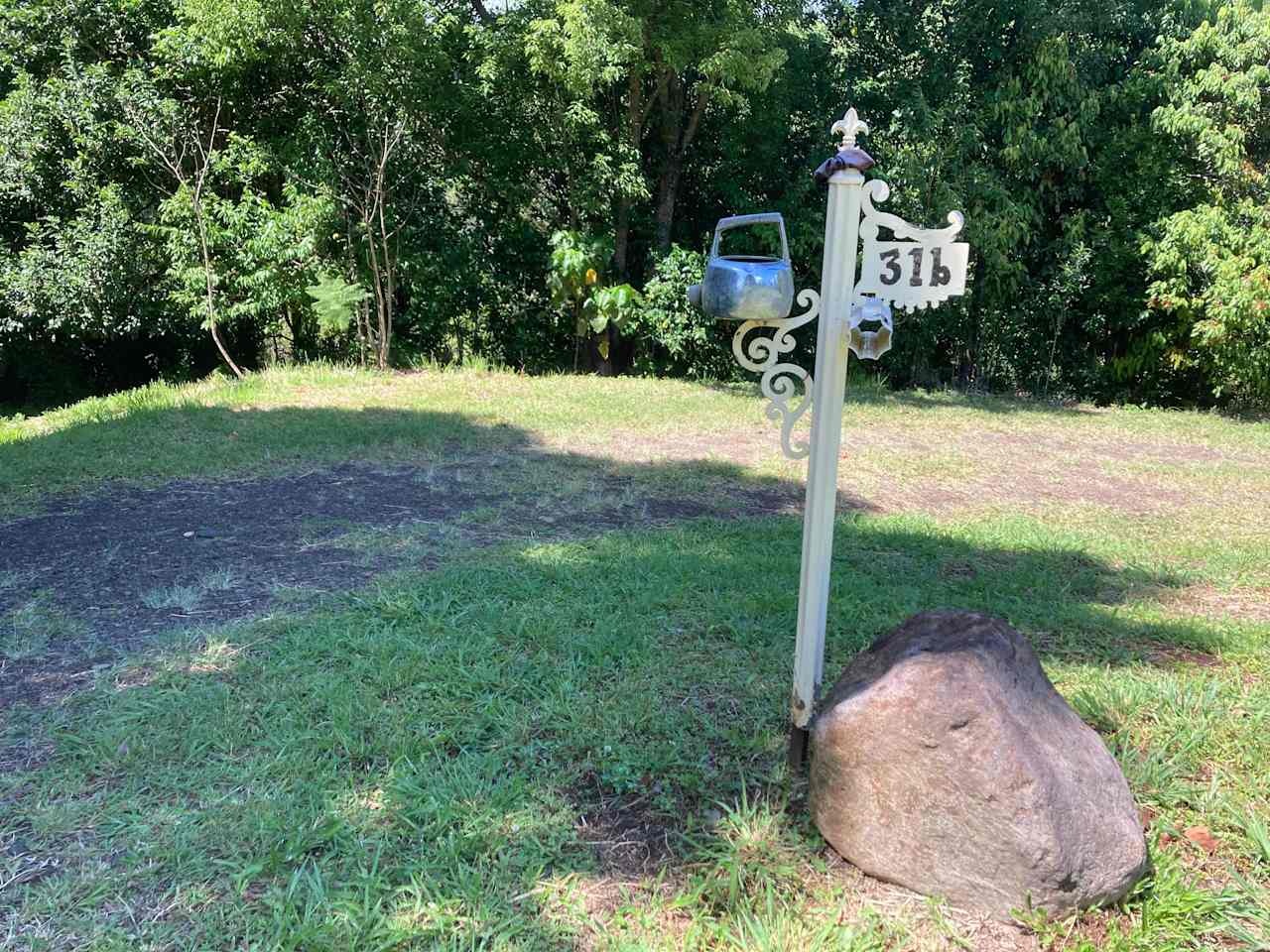 Look for this sign 700m up the dirt road. It goes down and to the right, with road-base and drainage for all-weather access. 