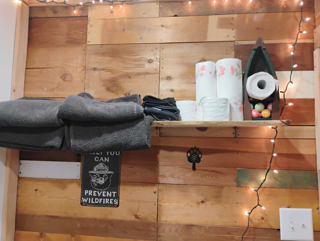 Towels on the shelf in your cabin.