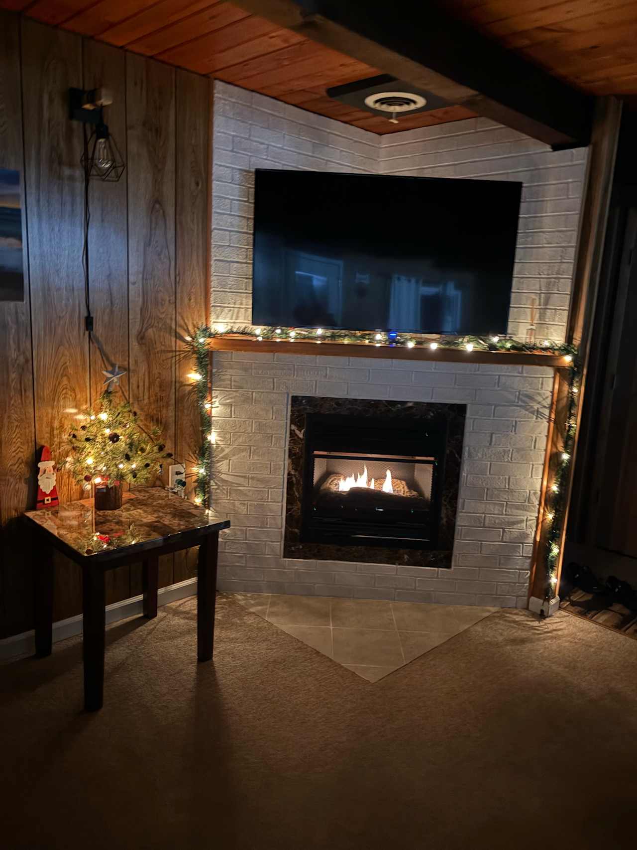 Cozy fireplace with some holiday cheer! 