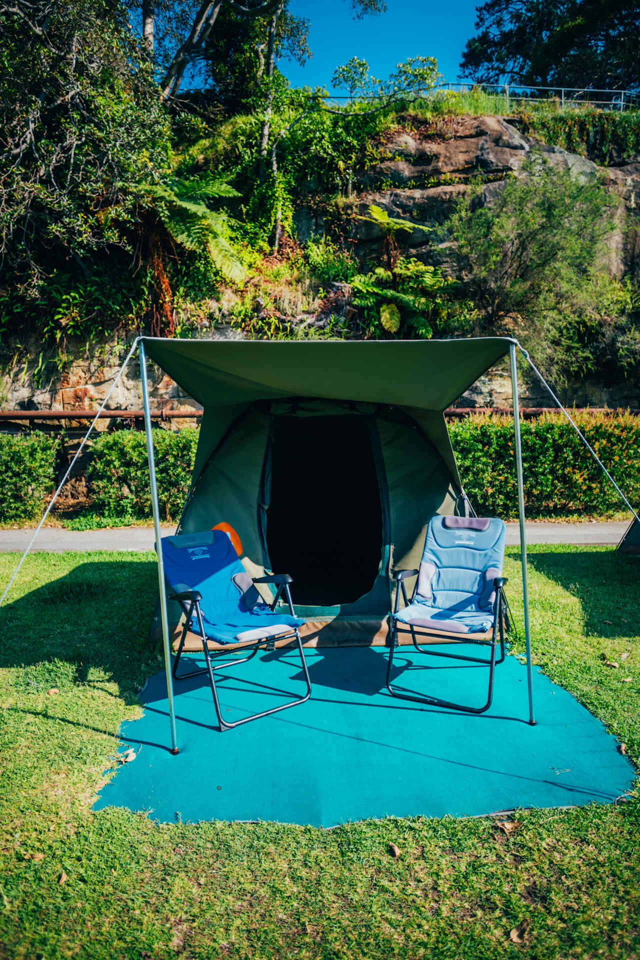 Sleeping mats and outdoor chairs provided. 