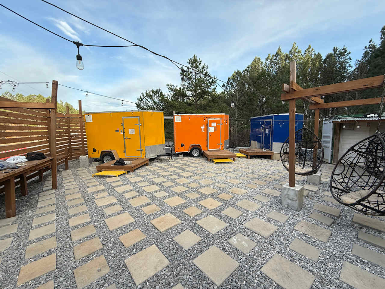 Courtyard with 3 bath houses and laundry facilities (2 washers and dryers) + swings too