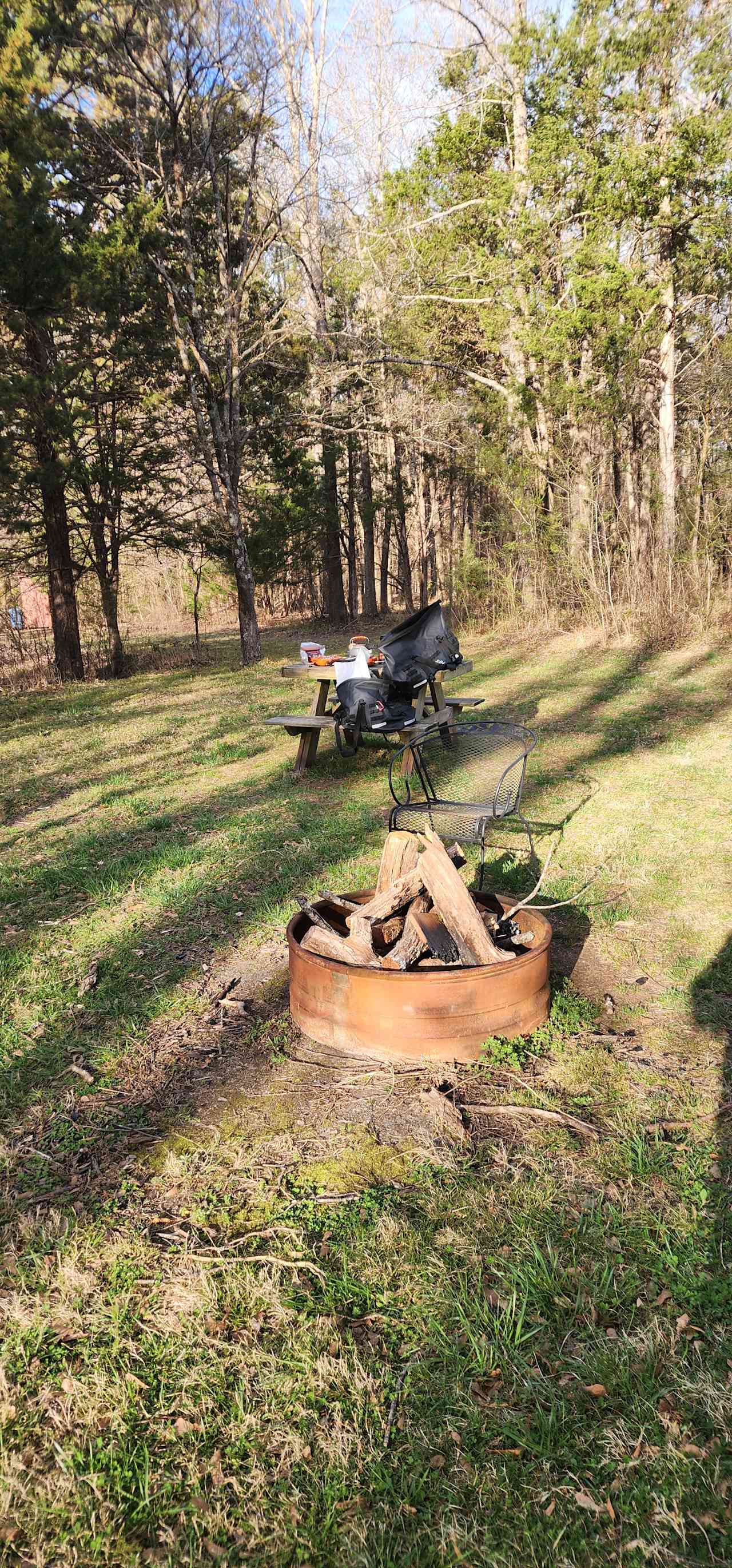 Fireplace and picnic table. 