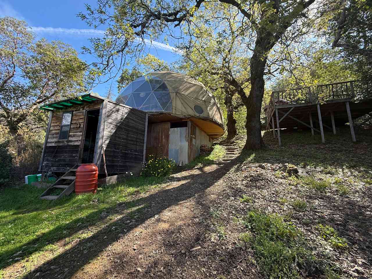 Full view of the dome from below and the bathroom, which also has a shower you can park right where I’m standing while I’m taking the picture which makes bringing things and unloading a lot easier