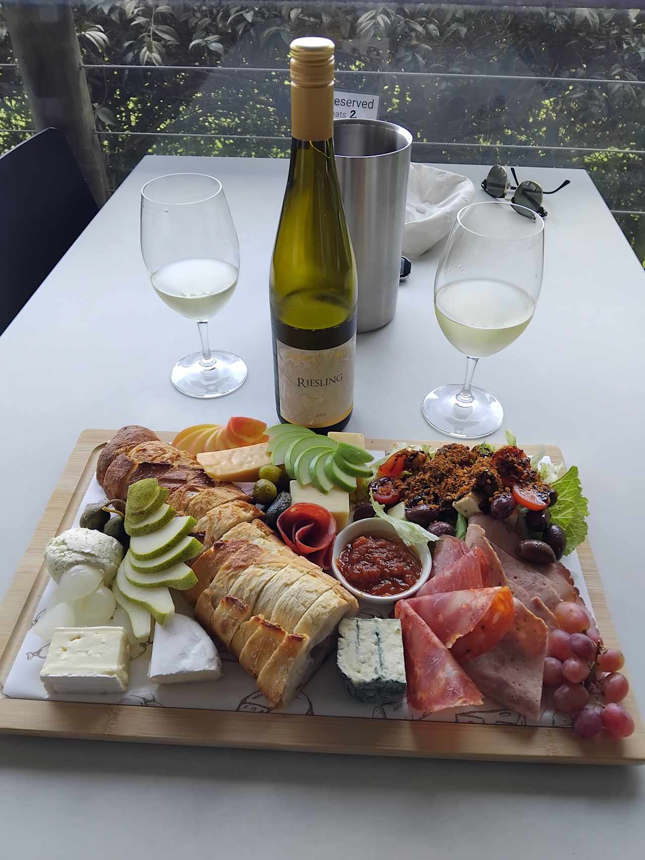 Ploughman's platter with a bottle of Duckett Mill Reisling