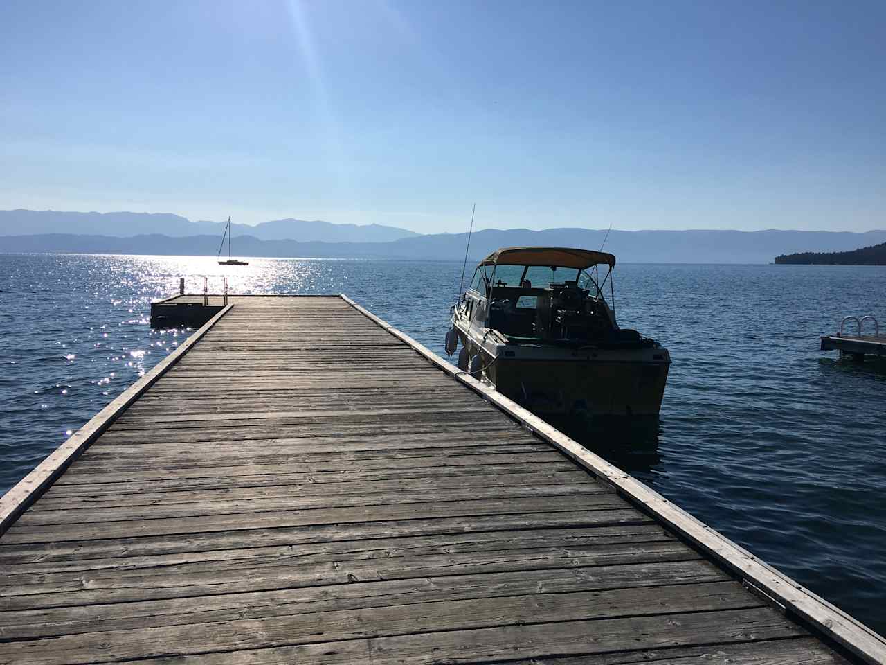 This is the public dock in Lakeside. My dad brings me here because there's a beach with swim platforms to dive off of, and lots of pretty girls. 