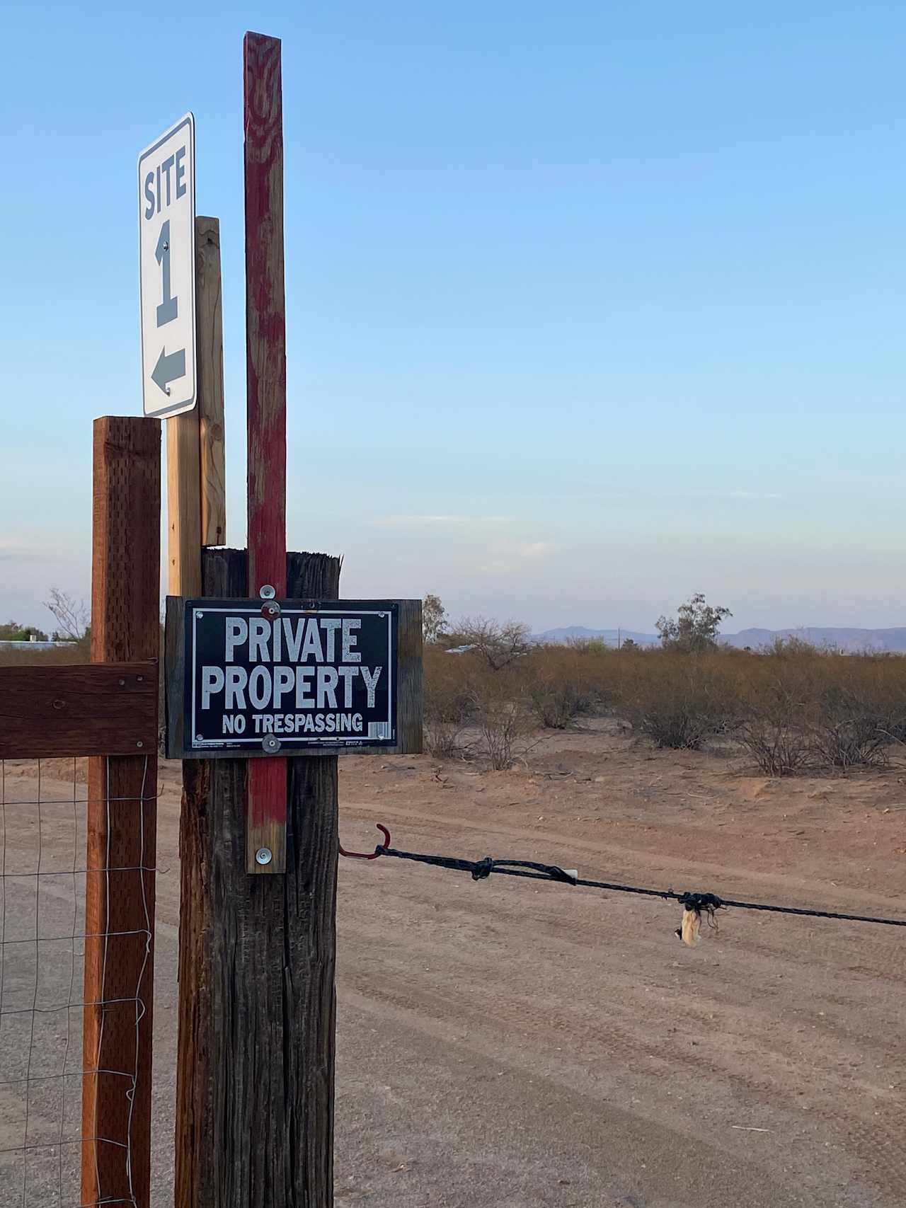 Entrance with rope and sign