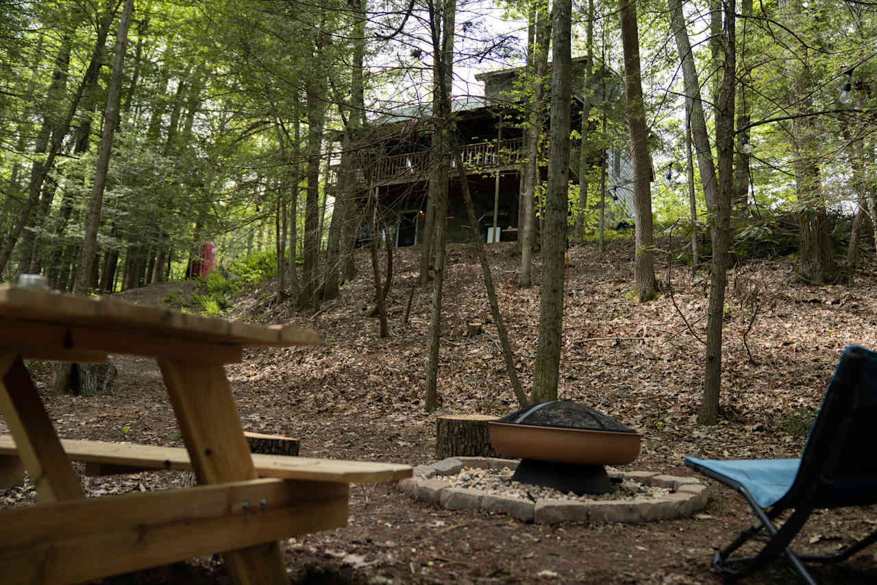 Our home rests at the top of the hill above camp -- we do not use the back-side of the house when we have campers! 