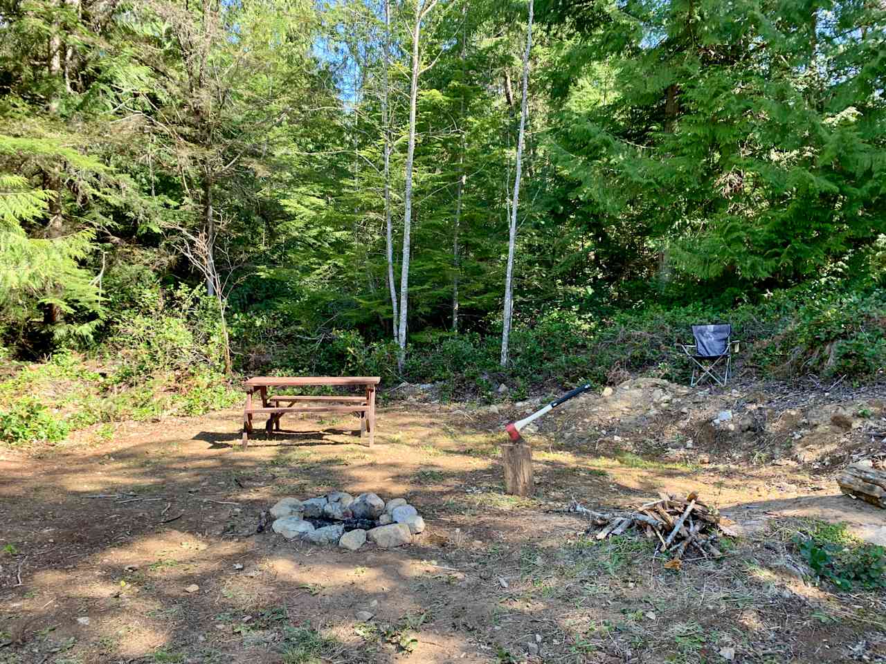 Beautiful, large sunny campsite with picnic table and fire pit.