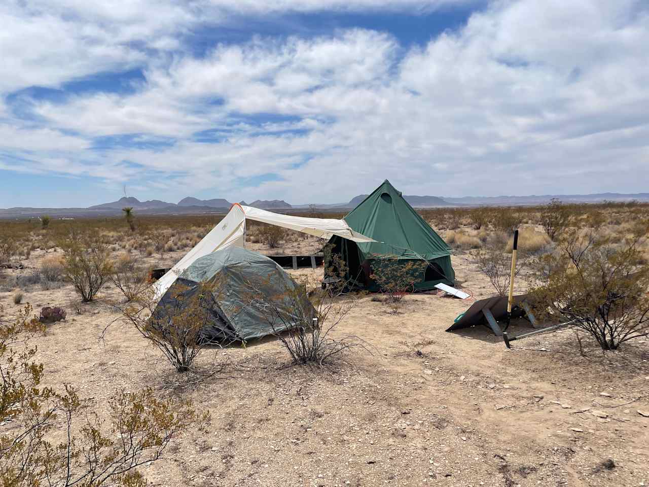 An example setup: you can pitch a large tent (10'), a shade structure, and a smaller tent. 