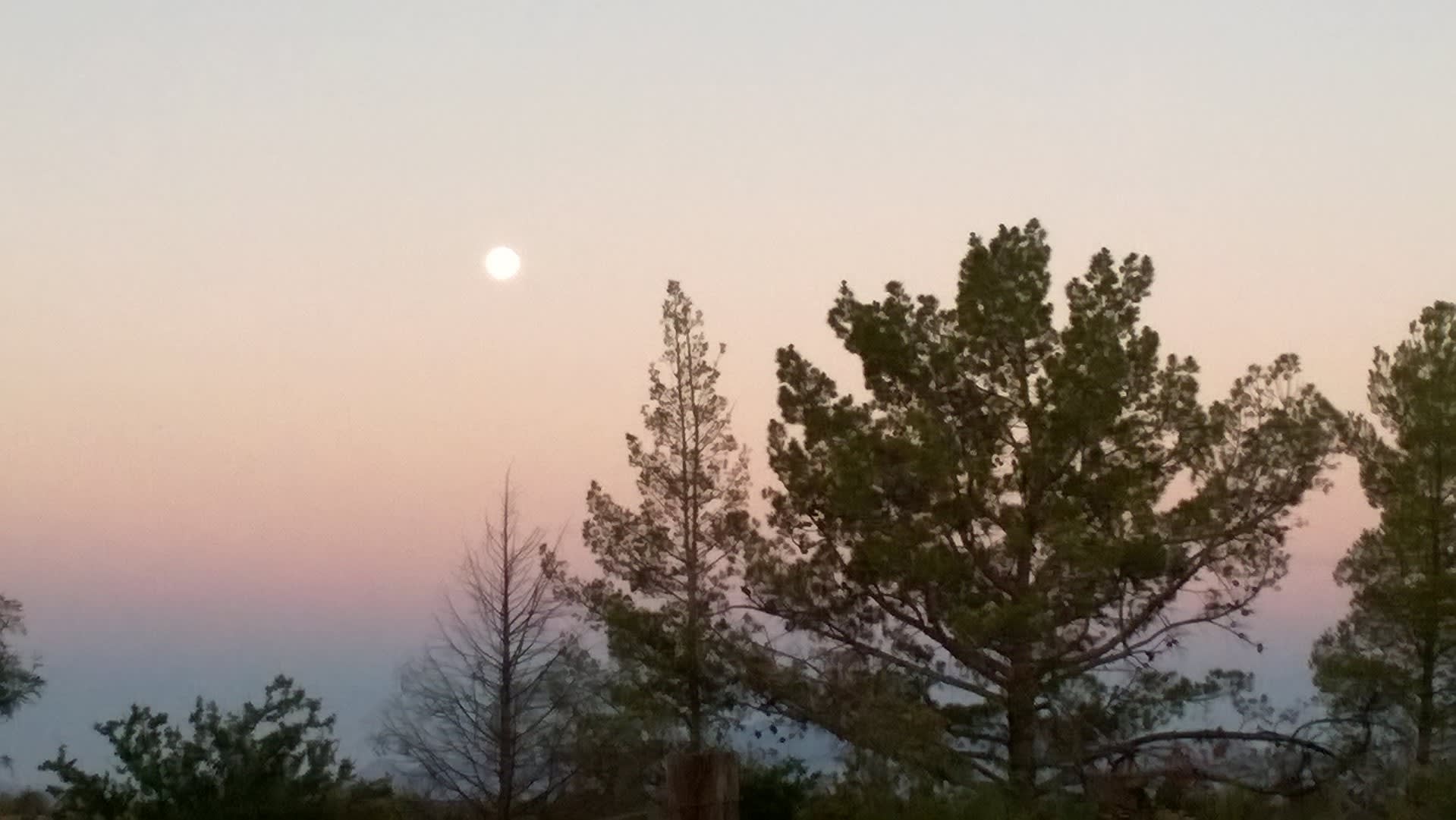 Moon Setting Over Naco Mexico While Sun Rises Over Bisbee, AZ