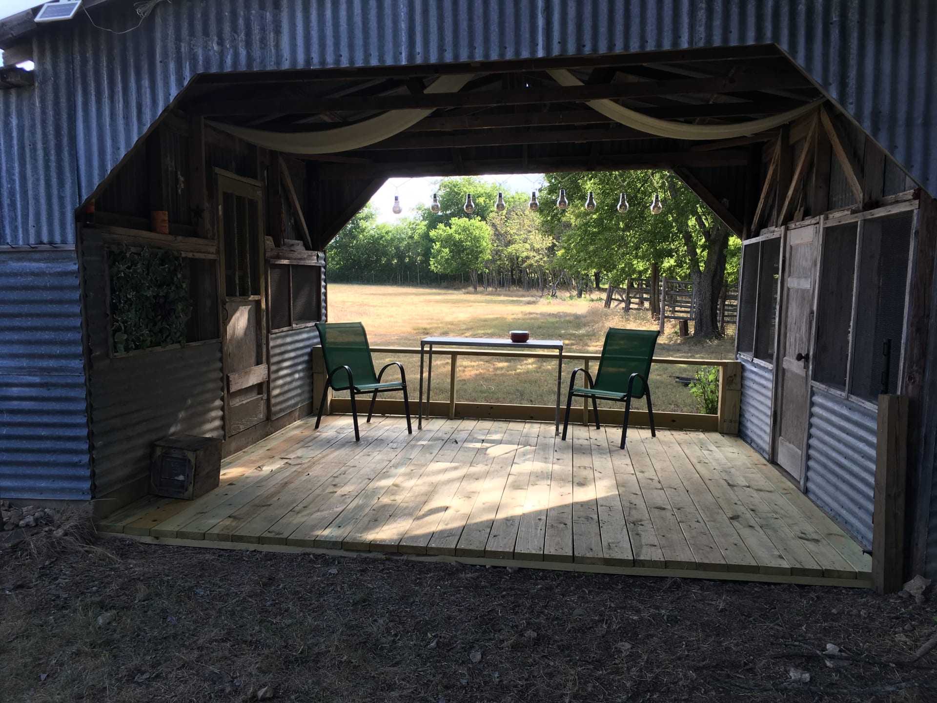 This building was renovated and made into a ramada,  A great place to enjoy or read.   It is located just feet from the cabin/tiny house. Note that it has been opened up to allow entrance to a fire pit.