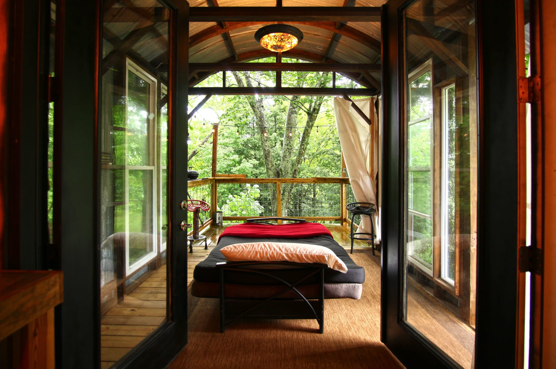 Magical indoor/outdoor sleeping space optimized for sounds of the waterfall.
