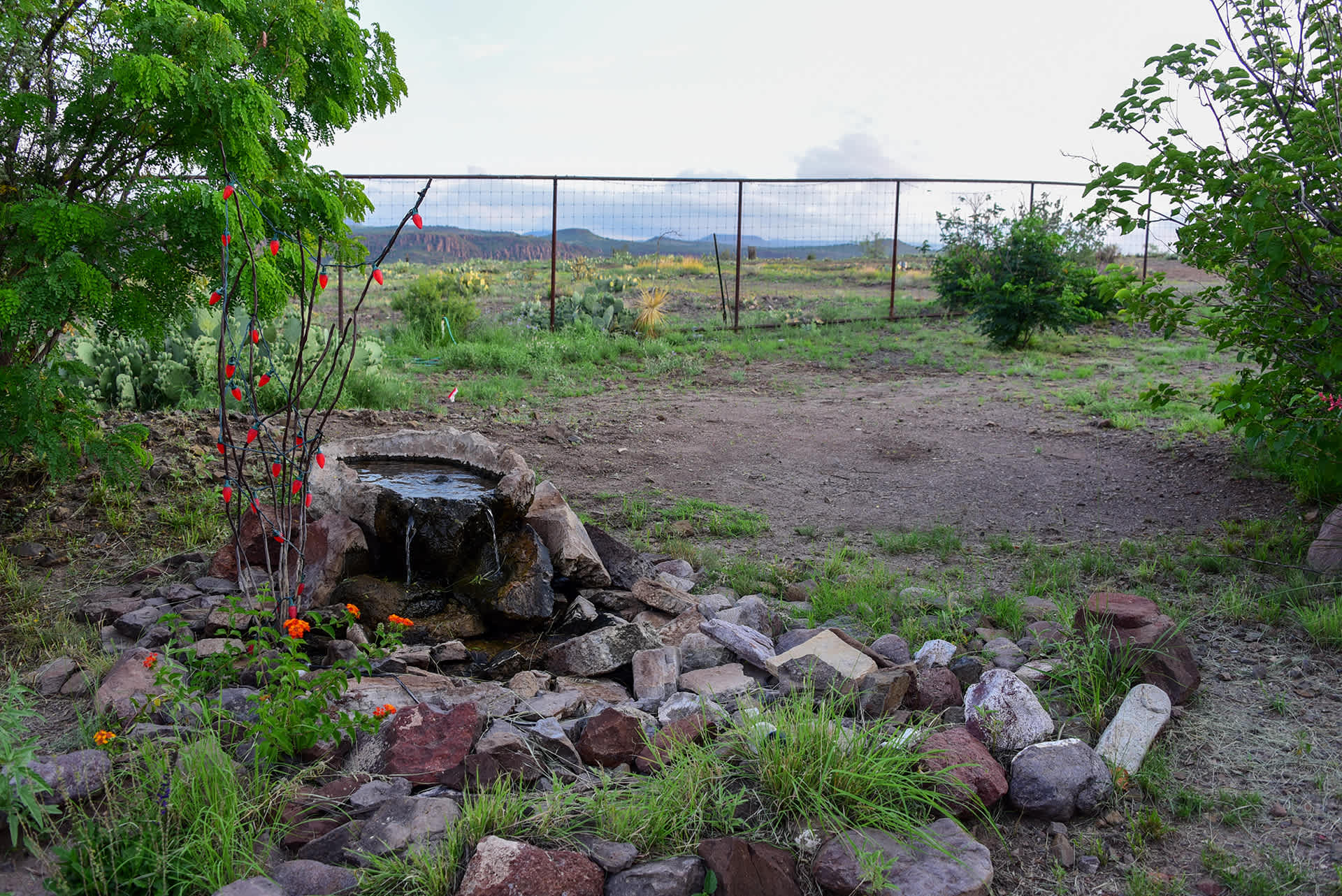 Tent camping site next to water feature