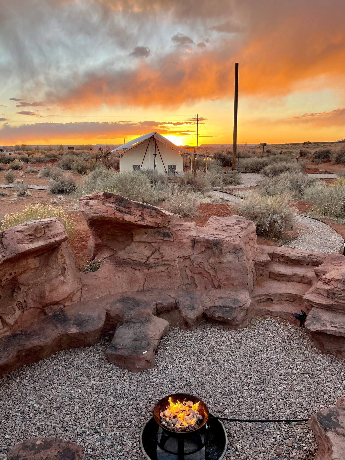 Our unique red-rock firepit is located at the center of the site for all guests to enjoy. Pictured here is Pancho's Villa
