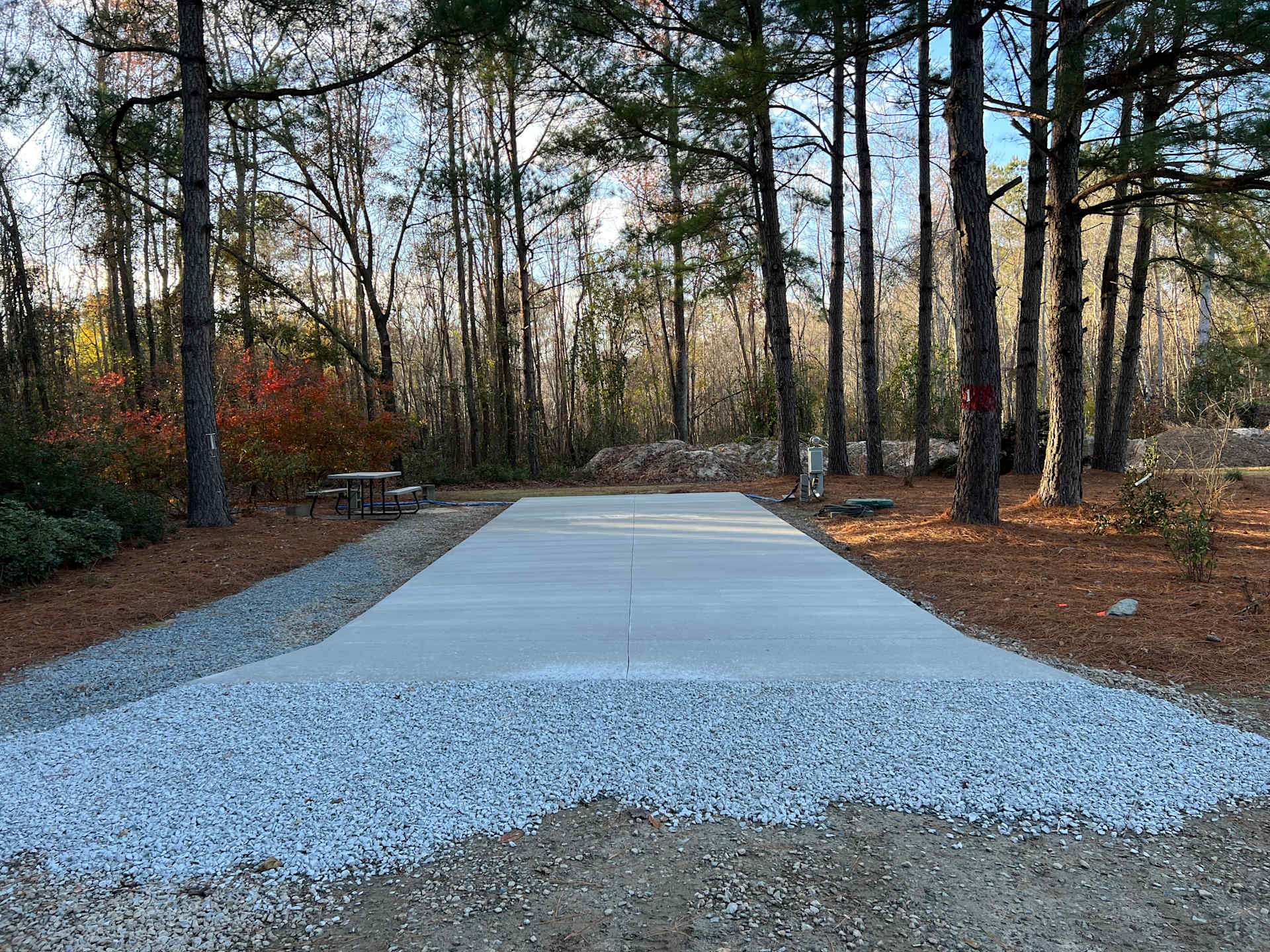 Site 1, full hookups, concrete pad, picnic table and fire ring.  